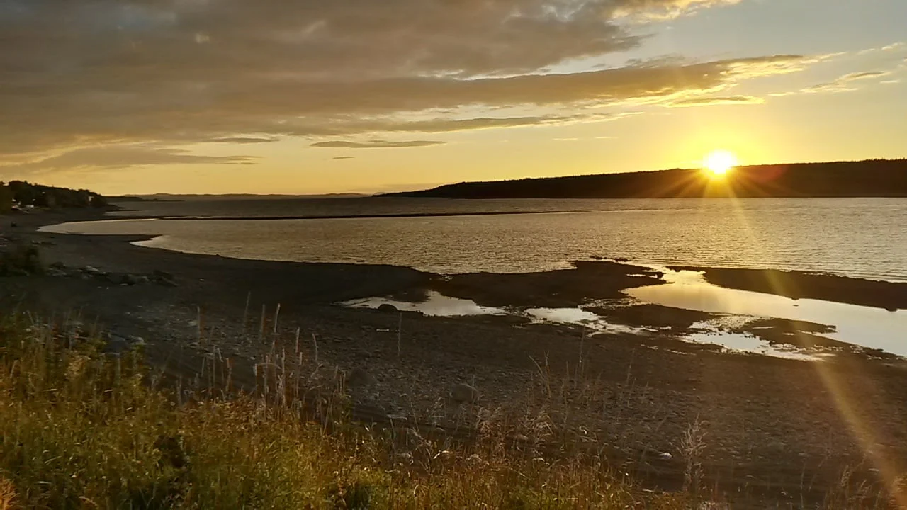 A beautiful Sunset in Millertown, the famous sandbar is seen in the distance.