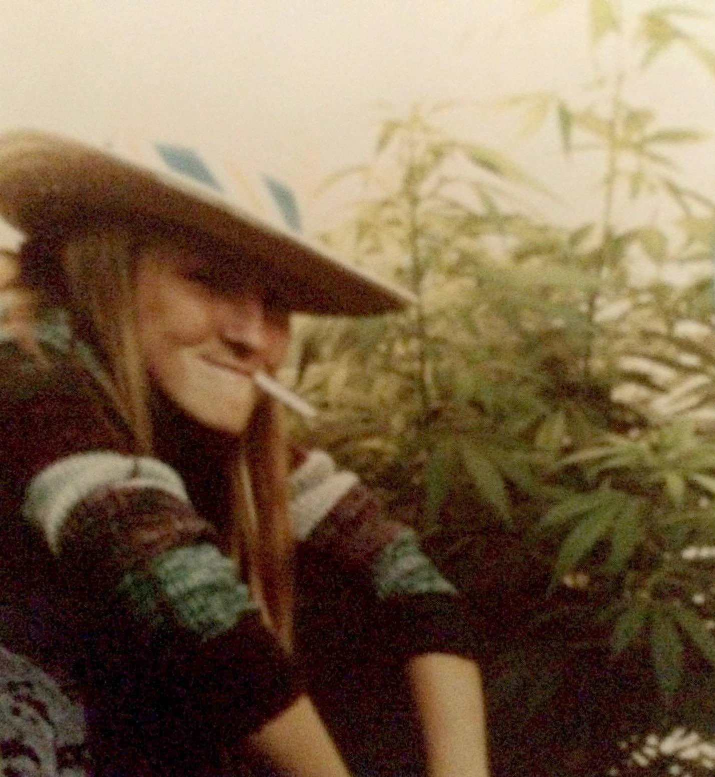 Letts at 16, yucking it up by some plants she grew in her mom's rose garden