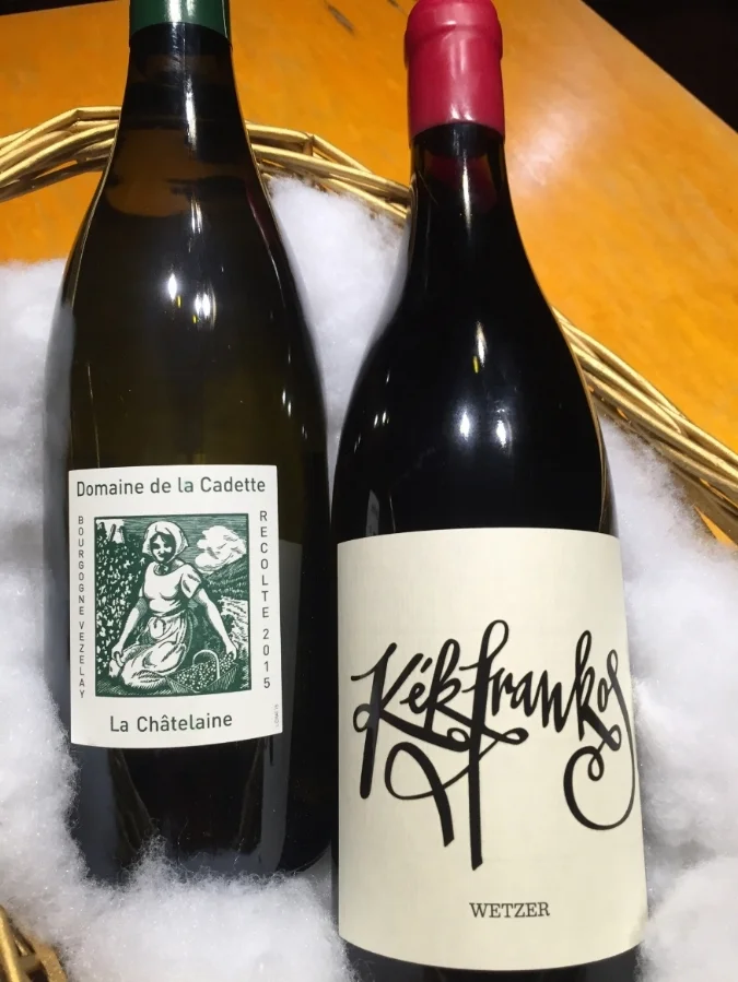 DOMAINE DE LA CADETTE 2015 La Châtelaine A winter white to satisfy all comers? A blissful Bourgogne that expresses itself truly, deeply? The very Vezelay that some of you have seen in our shop, on our list, is here. Vezelay? Bless you! Centuries of taking the back seat to other AOC, Vezelay finally achieved it’s appellation status in 1997, and the Montanets were given their due. First planting vineyards in 1987, they eventually realized that farming organically and splitting off from their cooperative was the best for their future. Their land lies west of the Cote d’Or, neighboring Chablis, and as such the grapes express themselves in similar fashion of freshness of fruit and true minerality. These wines that will continue to grow in complexity and status (and cost!) as the years progress, and are best served . . . Period. ________________________________________________________________ WETZER 2015 Kekfrankos The thought of drinking bull’s blood might have one imagining some sacred, pagan ritual, dark figures in shadowed robes chanting in ancient tongues and the red chalice passed to every patron for their sacramental sip. Some are very familiar with the reality of said sanguine fluid in the form of Hungary’s famous Egri Bikaver (Bull’s Blood), a rich, red wine from Eger whose main varietal is locally known as Kékfrankos. This January’s red hails from the neighboring region of Sopron, an area becoming more known on the world’s wine stage. Also known in Europe as Blaufränkisch and Lemberger, to name just a few aliases, Kékfrankos is an ancient grape that has been a regional favorite for centuries, and up until recently it was believed to be a clone of Gamay. Understandably, as it is similar in style and savor to Cru Beaujolais, yet still very much its own ‘beast’. Peter Wetzer is the 5th generation son of Sopron behind this delightful red, guiding his homeland specialty away from any commercialization practices and allowing for the true, natural, and yes organic qualities to shine. It balances between unrefined and graceful, dark, richer fruit components working into the kind of spice blend that can only make one hungry (Hungary!) from the first sniff. To continue the appetite appeal: Gulyas (Goulash) Soup Serves 6 Ingredients: ½ cup oil 1 large onion (chopped) 1 tsp caraway seeds 4-5 cloves garlic (minced or grated) 2 med sweet wax or bell pepper (diced 2 fresh tomatoes 2 tbs Hungarian paprika powder 1 lb beef (cut to ½” cubes) 2 carrots (peeled and chopped) 1 med celery root (peeled and diced) 1 bunch fresh parsley leaf (bunched like a ball) salt Dumplings: 1 large egg 1 ½ cup flour 2 tbs oil Pinch of salt Heat oil in a large, heavy pot over medium-high heat. Add onion; saute until soft and translucent but not brown, about 5 min. Add garlic and caraway seeds; cook about 1 min. Add diced pepper; cook for 3-4 more minutes. Add tomato and cook 5 min longer. Add meat and sprinkle paprika powder on top and stir. Cook it covered for about 15 min, stirring frequently not allowing it to stick to the pan. Add enough water to cover the meat. Bring to a boil and simmer slowly about an hour or until the meat is soft. Add more water, carrots, celery root and potato and simmer. Beat the egg with salt and ½ cup of water, then add enough flour to make a smooth, viscous dough. Push the dough through a dumpling strainer into the boiling soup. Add bunched parsley leaf and cook for 10 more min. Salt to desired amount and serve.