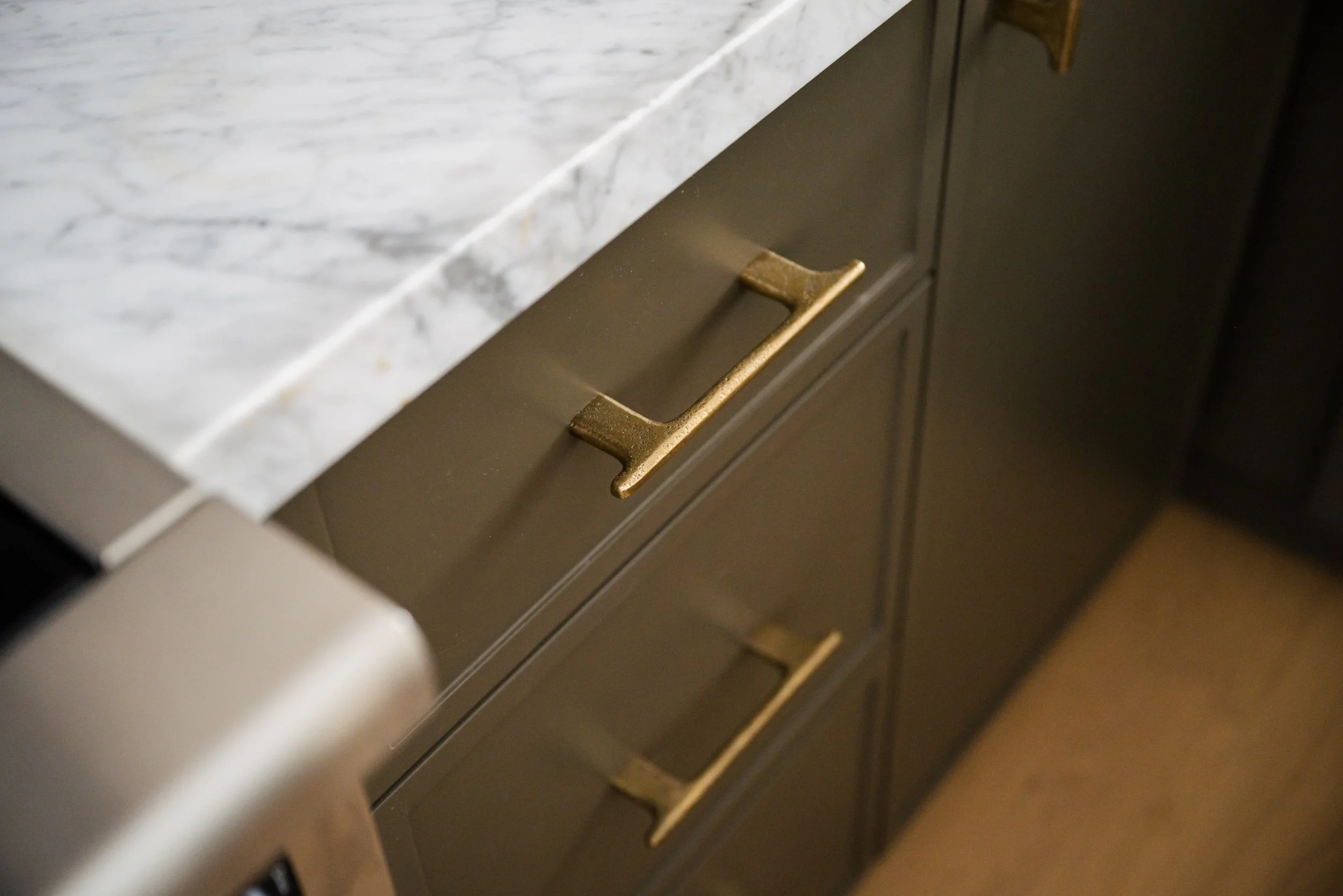Close up of kitchen cabinet drawer handle pull