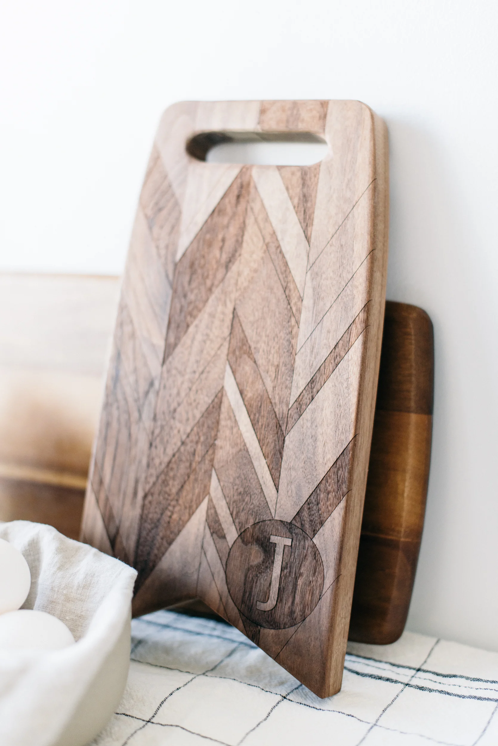 This beautiful monogrammed walnut cutting board by American Heirloom is one of my favourite pieces.