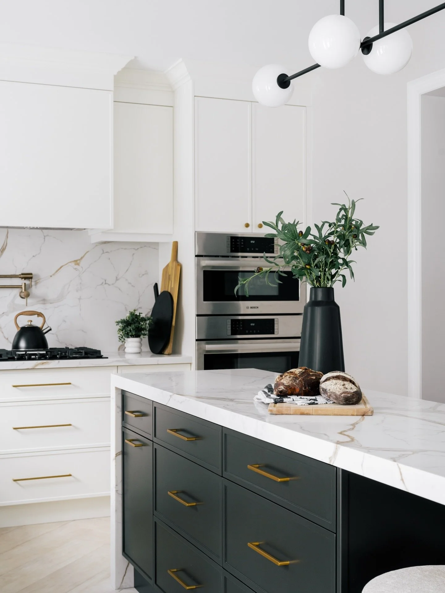 When this long kitchen was divided by a peninsula, @belyndacheninteriors changed the layout and flow by turning it into an island. This created more countertop space for food prep, more storage, and still included seating.

An entire built-in pantry 