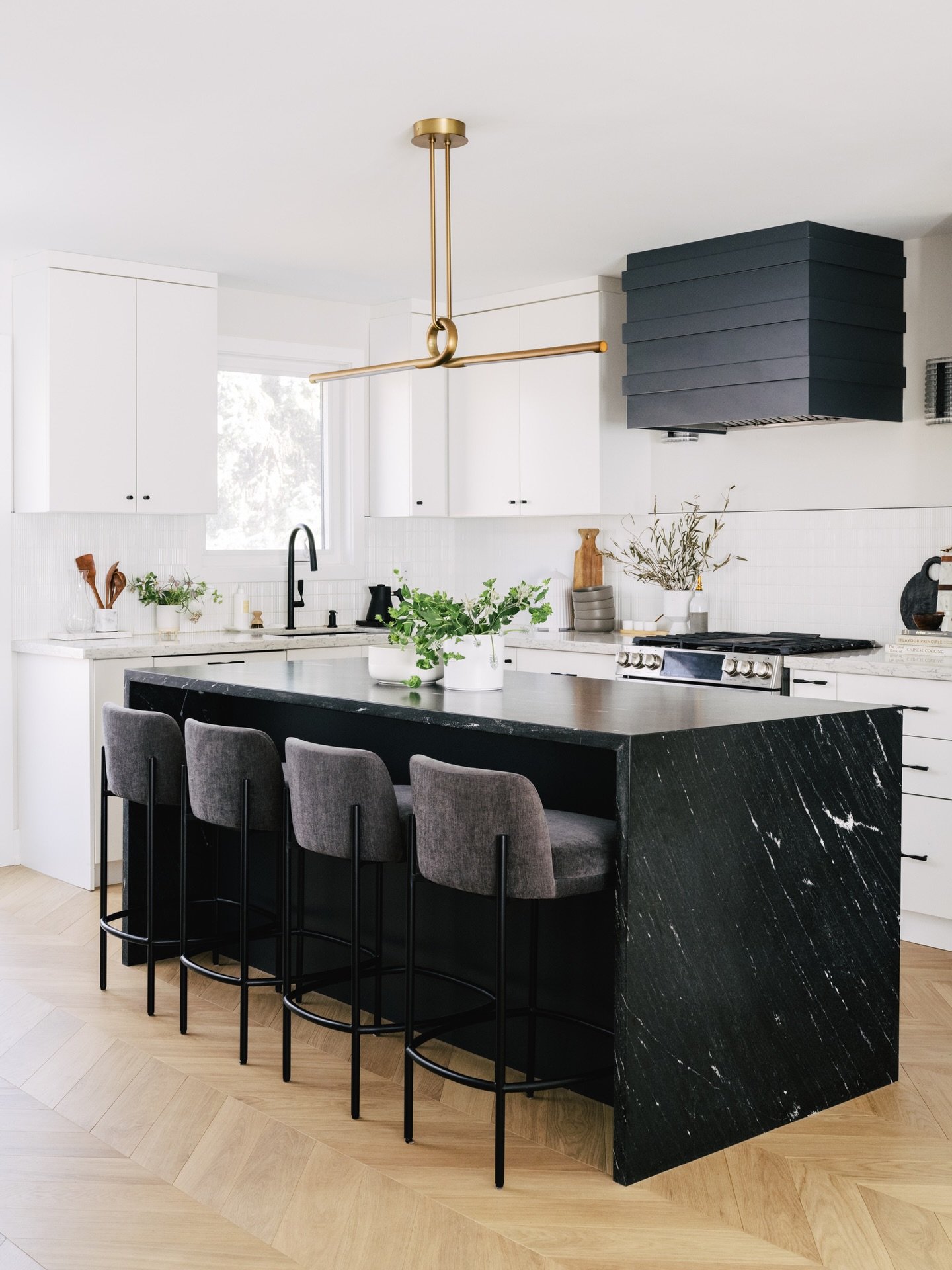 Kitchen tour: Add a personalized touch to your kitchen by choosing details with a little fun like these drawer pulls with a twist, cool light fixtures, and backsplash tiles with texture.

I love that these details can change the style and feel of the