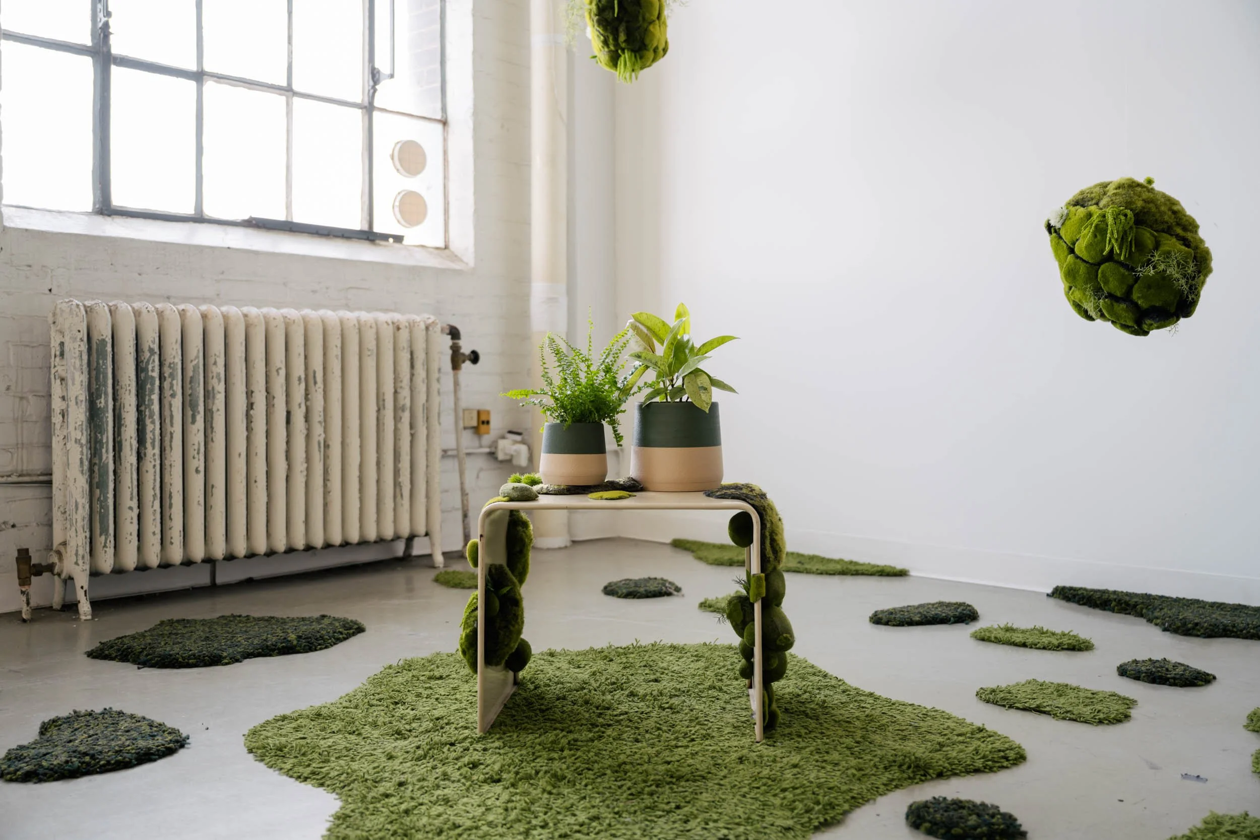 Two green and beige Sonnihaus planters