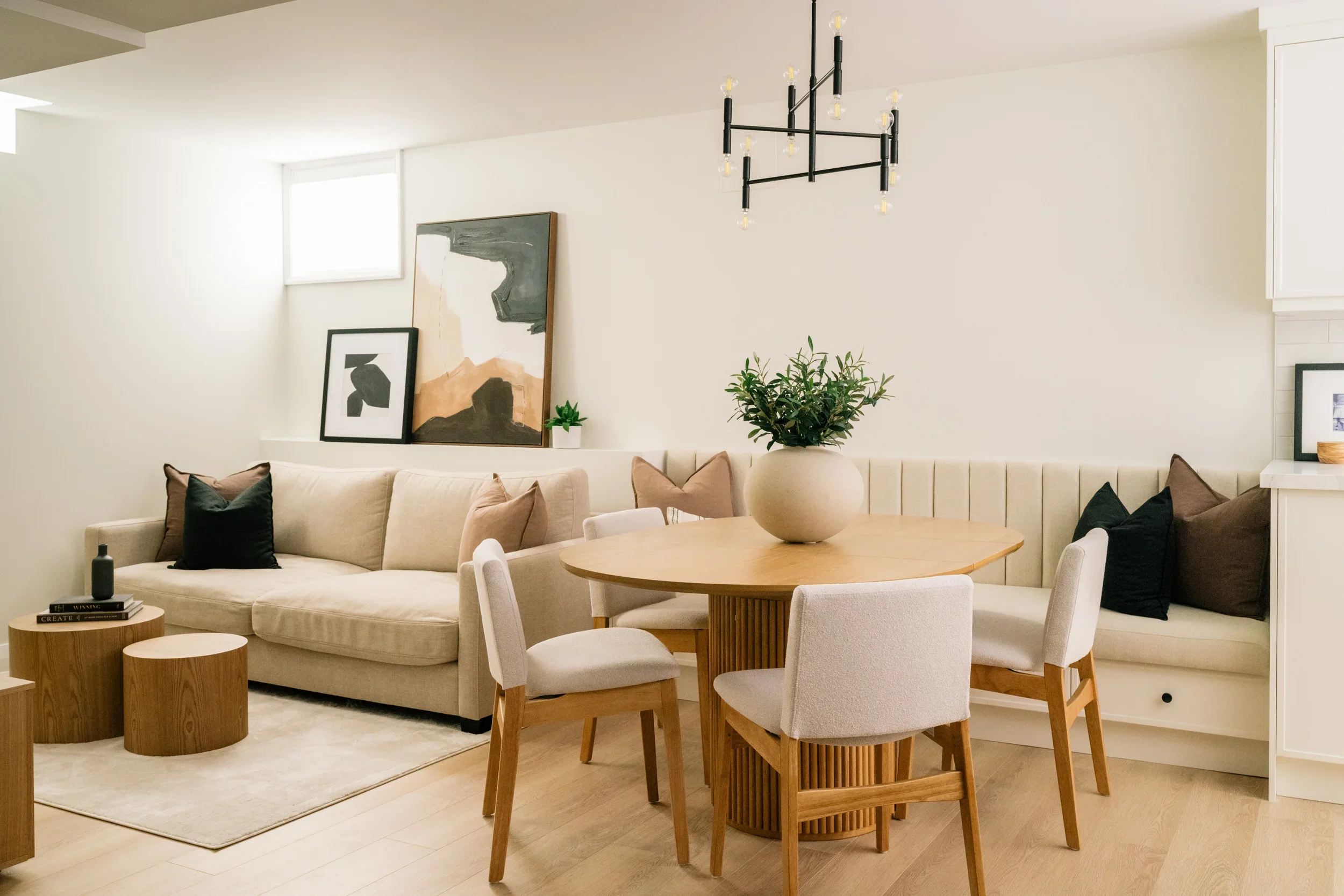 A living and dining space in a renovated basement
