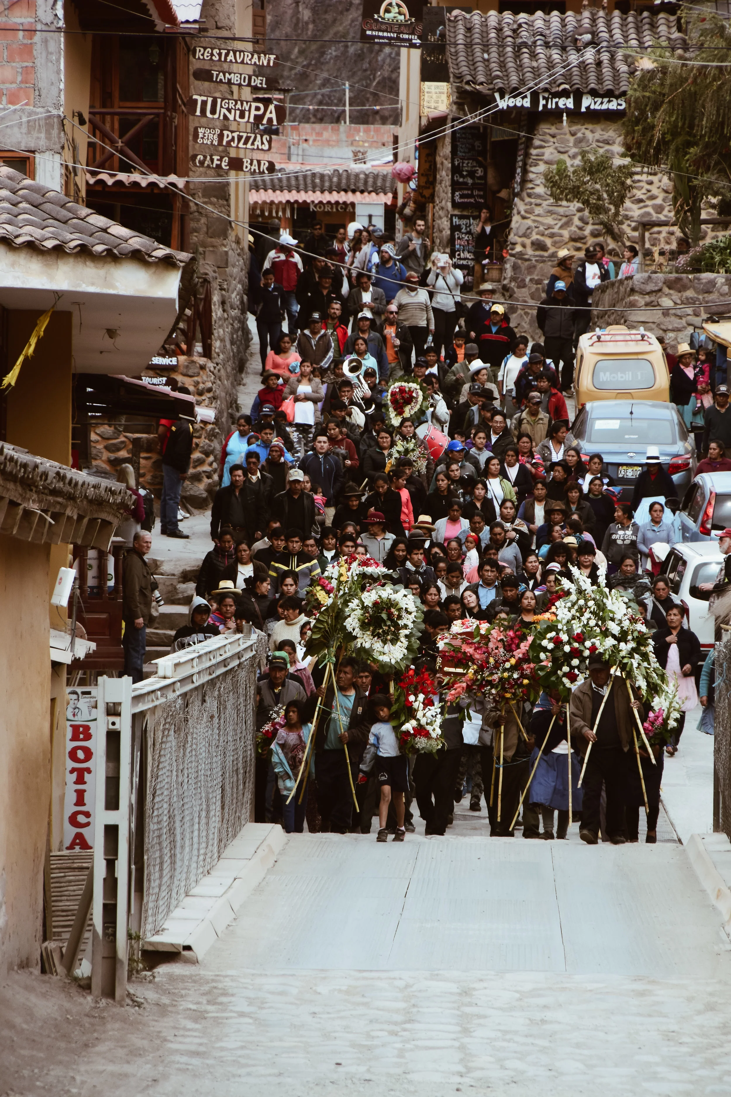  ^^ locals gathering for a funeral service in ollantaytambo 