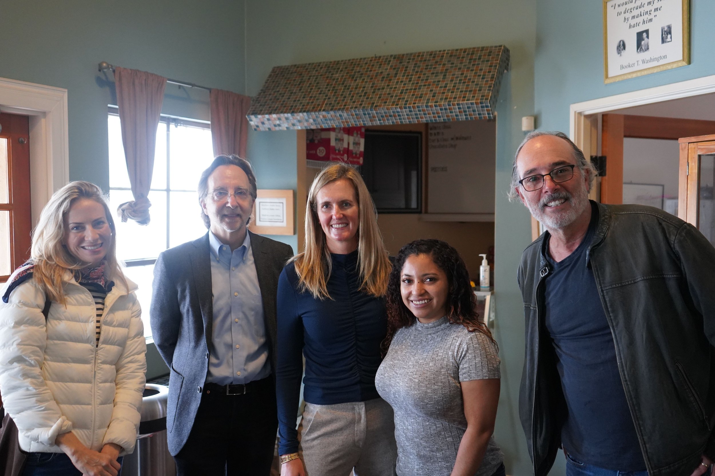 Emily Brown, David Lash and Matthew Irmas from the Irmas Family Foundations with Claire and Lucy from Strive