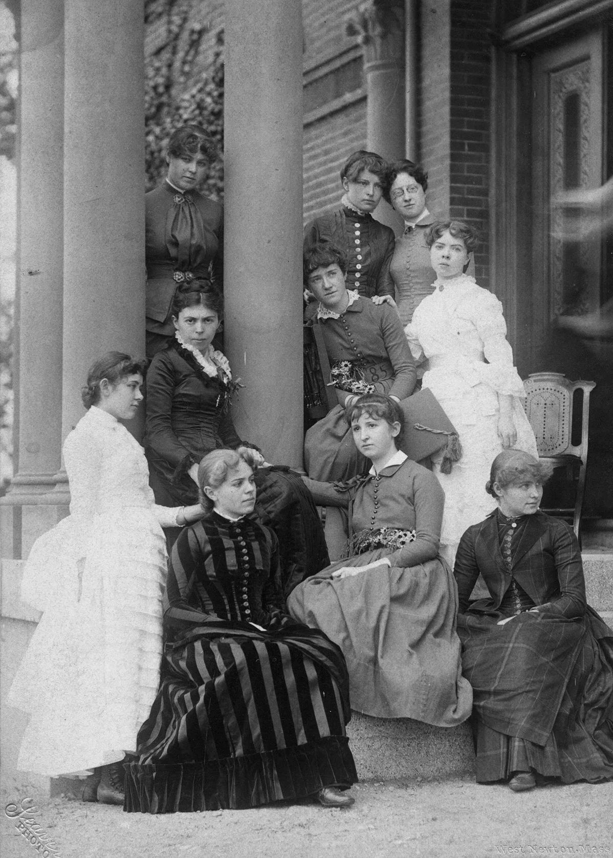 When Katharine returned to teach at Wellesley in 1885, she was greeted by young president Alice Freeman, second from left standing next to the column, appointed when she was 26 years old. Photo courtesy of Melinda M. Ponder and the Wellesley College Archives