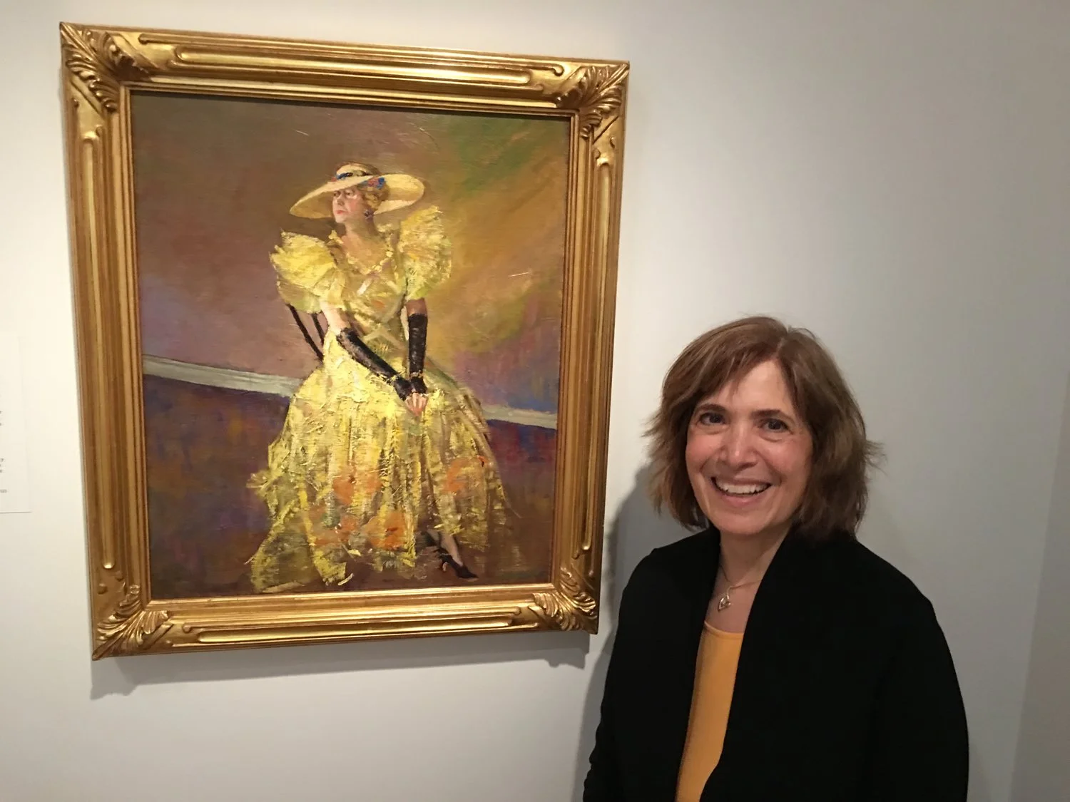 Nancy with a Laura Wheeler Waring painting of Alice Dunbar Nelson at the Smithsonian Institution’s National Portrait Gallery in Washington D.C. The painting is reproduced in the book, ‘Beautiful Shades of Brown,’ illustrated by Felicia Marshall