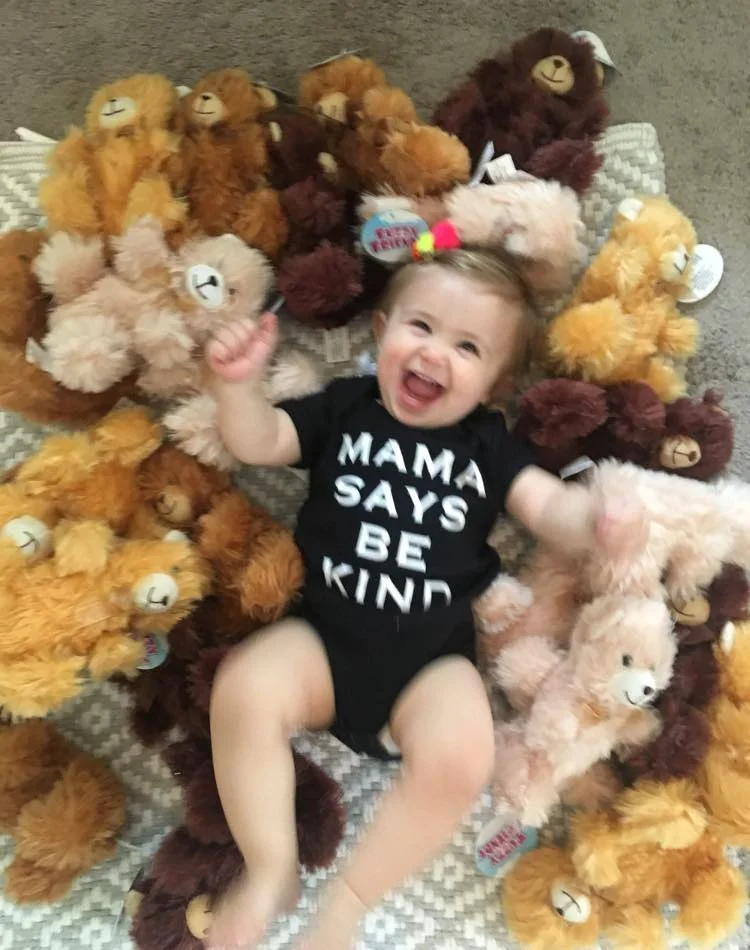 Do you think Avivah Rhodes is happy because she has a lot of teddy bears? No, Avivah Rhodes is happy because she spent her 1st birthday, Sept. 9, 2019, with Kind Day festivities, which included giving all these teddy bears to kids at Children’s Medical Center in Plano. Her mom, Shayna, celebrates her daughters’ birthdays every year with a Kind Day. That’s when Avivah and big sister, Mila, give back to people in their community and around the globe. Here are some more of the great things Avivah did: -Paying it forward for a few others at McDonald’s drive-thru Giving monetary donations to: - Humane Borders (Sets up water stations for migrants in Arizona) - Dallas Children’s Advocacy Center (Dining Series - funds meals for children & families during therapy sessions) - Wholesome Wave (Makes fresh fruits & veggies affordable & accessible for families in need) #AvivahMovesMountains #MilaMovesMountains #ShaynaMovesMountains #BeKind