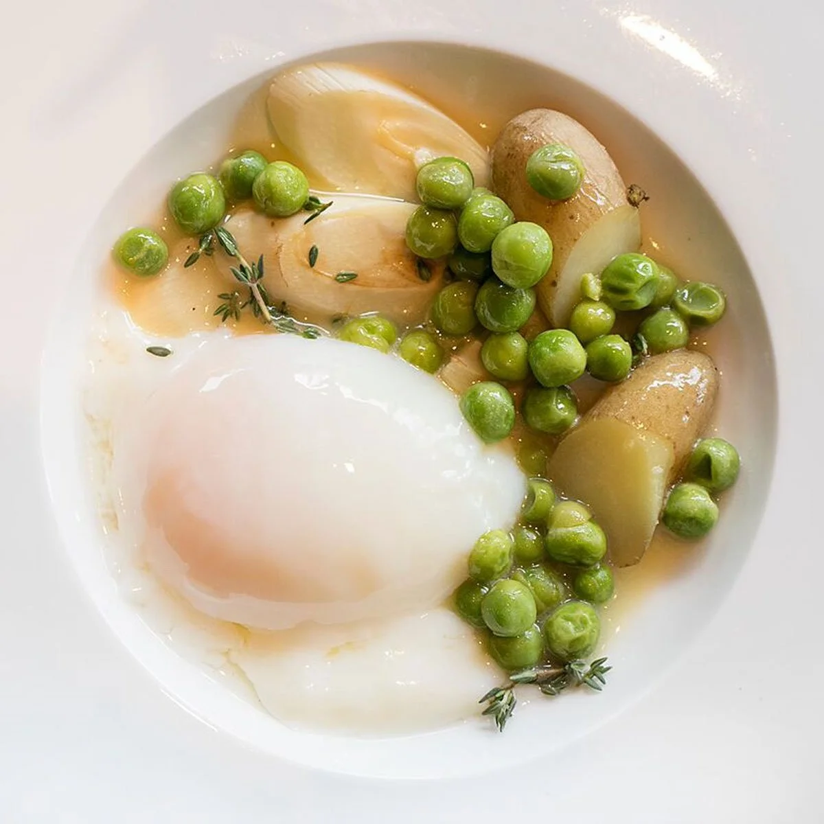 Duck Egg with Hearts of Palm, Fingerling Potatoes & Peas