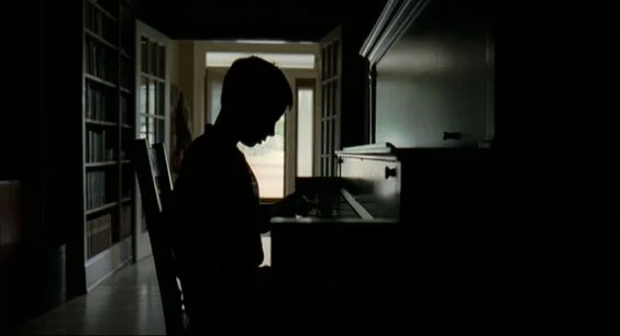 Using shadow and silhouette to evoke mystery and tension