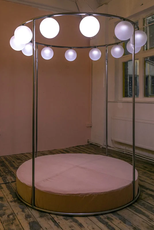 Penelopes Wheel, 2016, steel, mattress, velvet, sandblasted glass, LEDs, electrics and motor, 200x155x155cm