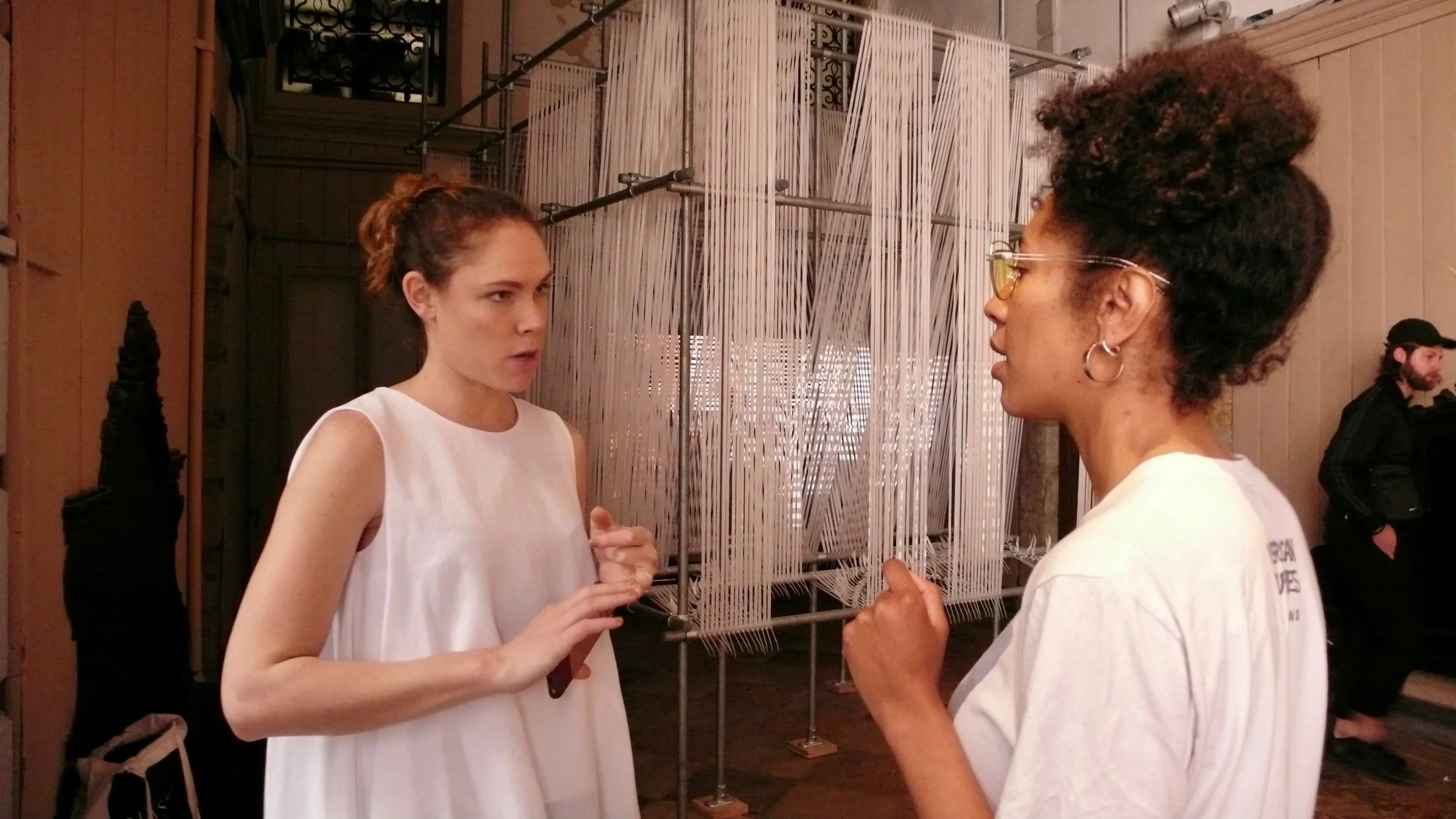 Jess Taylor and and Libita Clayton in front of Erika Tan, The 'Forgotten' Weaver.