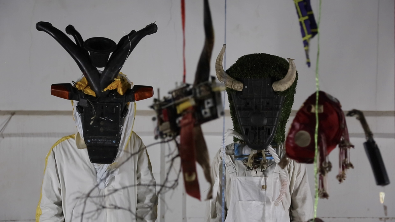 Hamedine Kane, Stéphane Verlet-Bottéro, and Nathalie Muchamad with Olivia Anani and Lou Mo, still image from The School of Mutants, 2020, wood, cotton, wax, pigment, paper, ink, sound, HD video, dimensions variable.