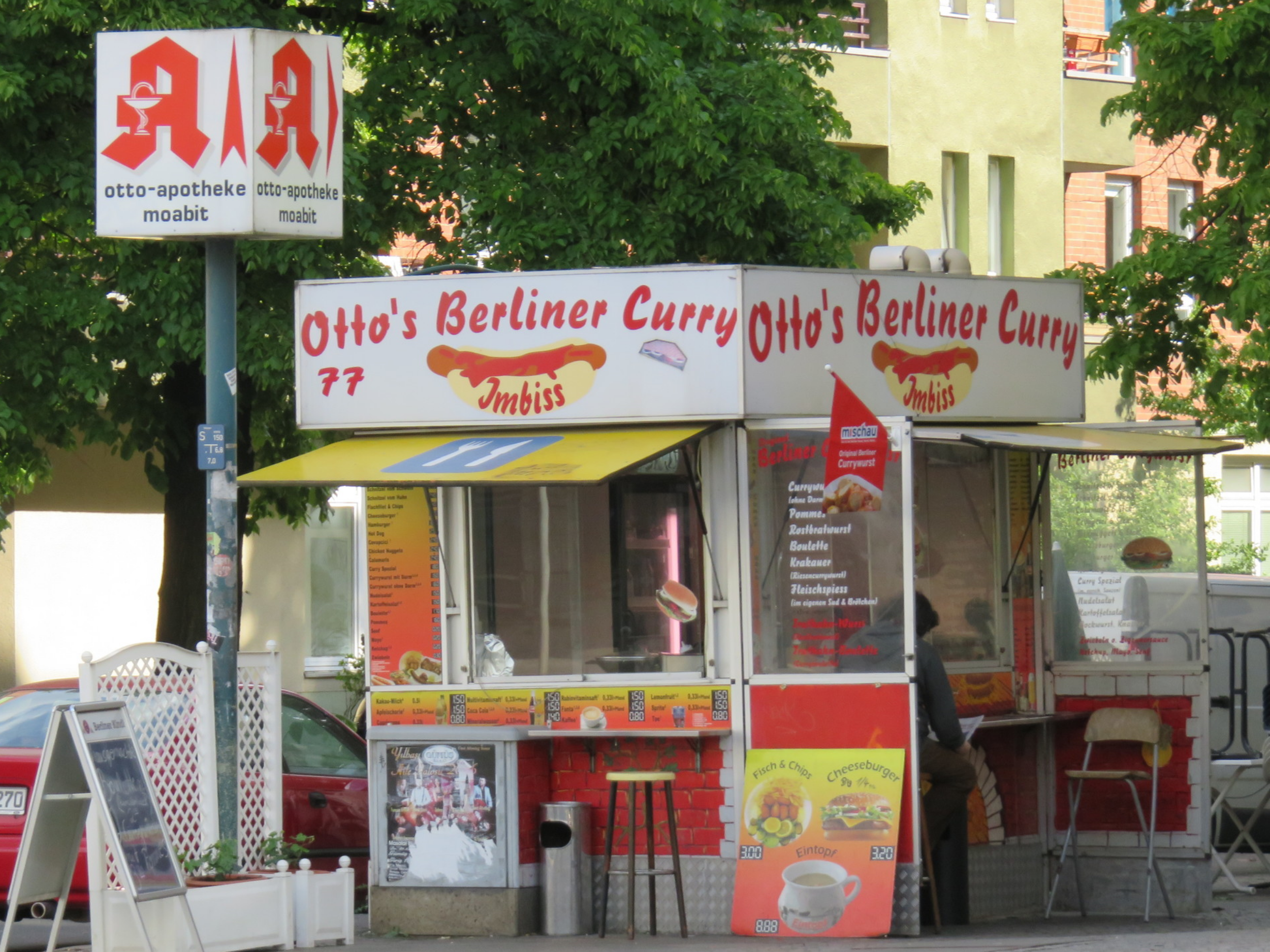 The complimentary signs of Otto-Apotheke and Otto's Berliner Curry, Ottostraße.