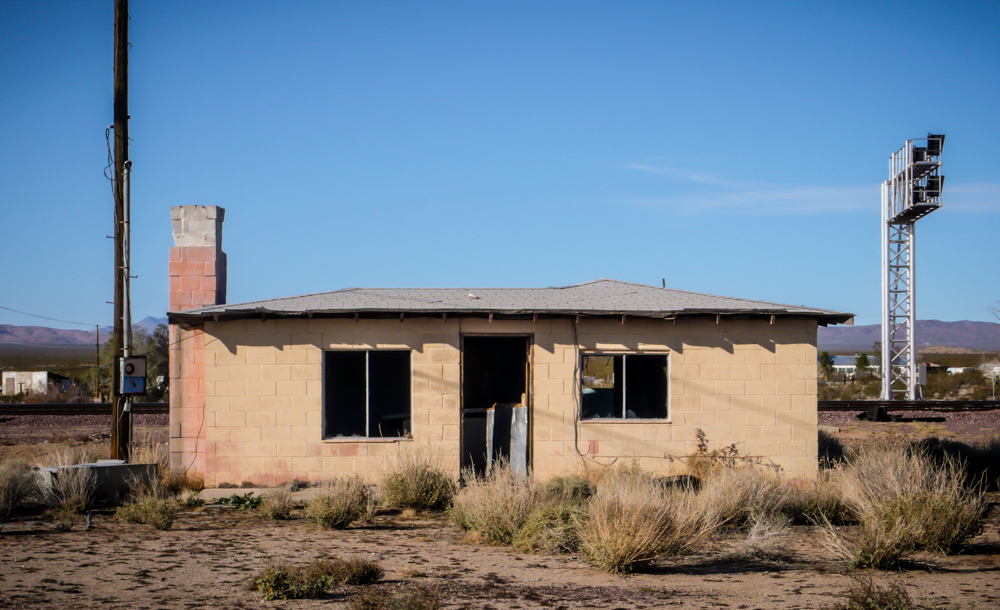 An abandoned building next to the train tracks in Goffs, CA.