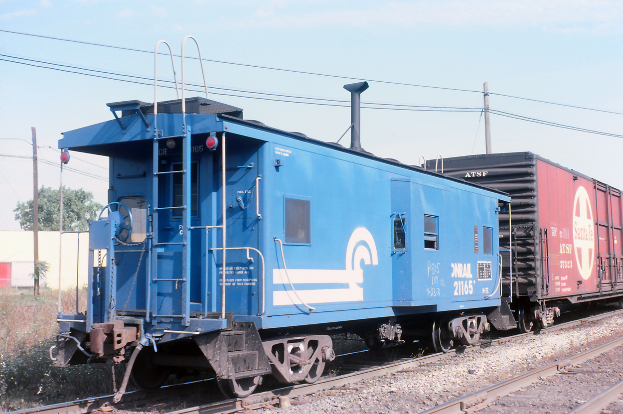 CR 21165 passes Delray Tower in Detroit, MI on the rear of a freight train in October 1976. (Jason Berkner collection)