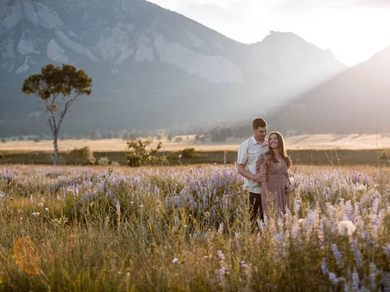 Couple in a mountain meadow for Forever Green