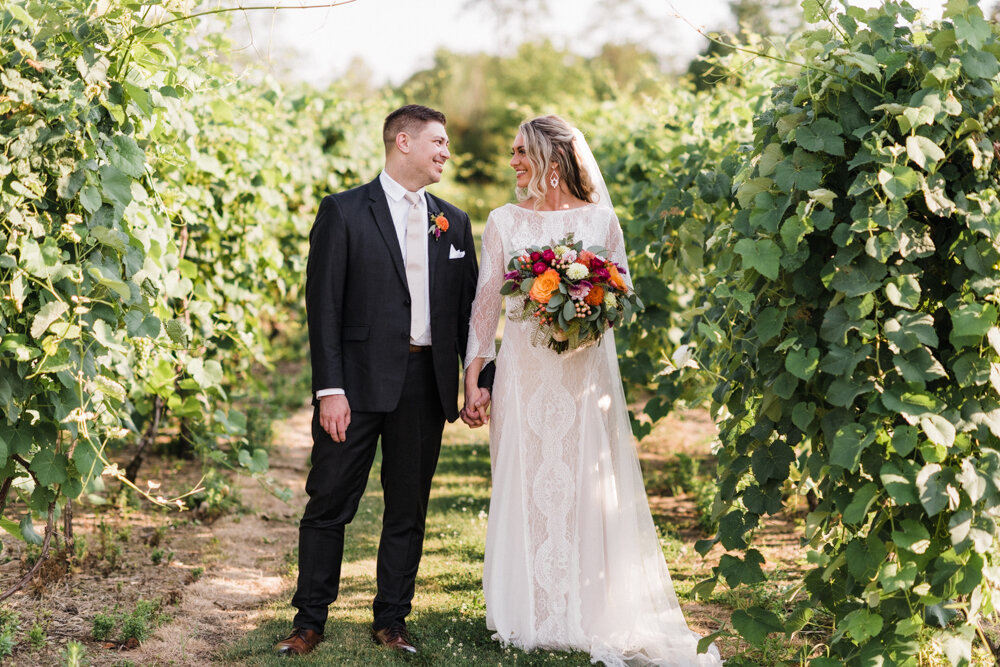 courtney and andys colorful summer vineyard vintage wedding at the vineyards at pine lake in columbiana ohio and hilton by doubletree in downtown youngstown ohio photographed by youngstown wedding photographer mae b photo-13.jpg