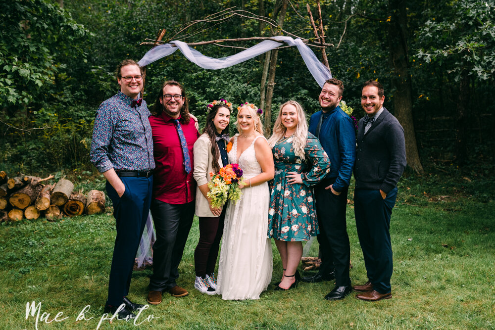 allie and nickie's colorful summer backyard pride wedding in kent ohio photographed by youngstown lgbtq wedding photographer mae b photo-67.jpg