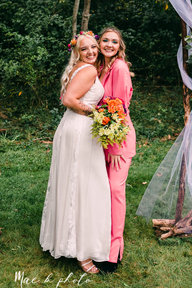 allie and nickie's colorful summer backyard pride wedding in kent ohio photographed by youngstown lgbtq wedding photographer mae b photo-65.jpg