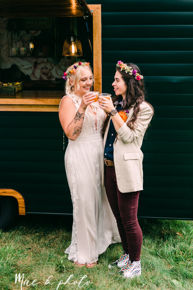 allie and nickie's colorful summer backyard pride wedding in kent ohio photographed by youngstown lgbtq wedding photographer mae b photo-116.jpg