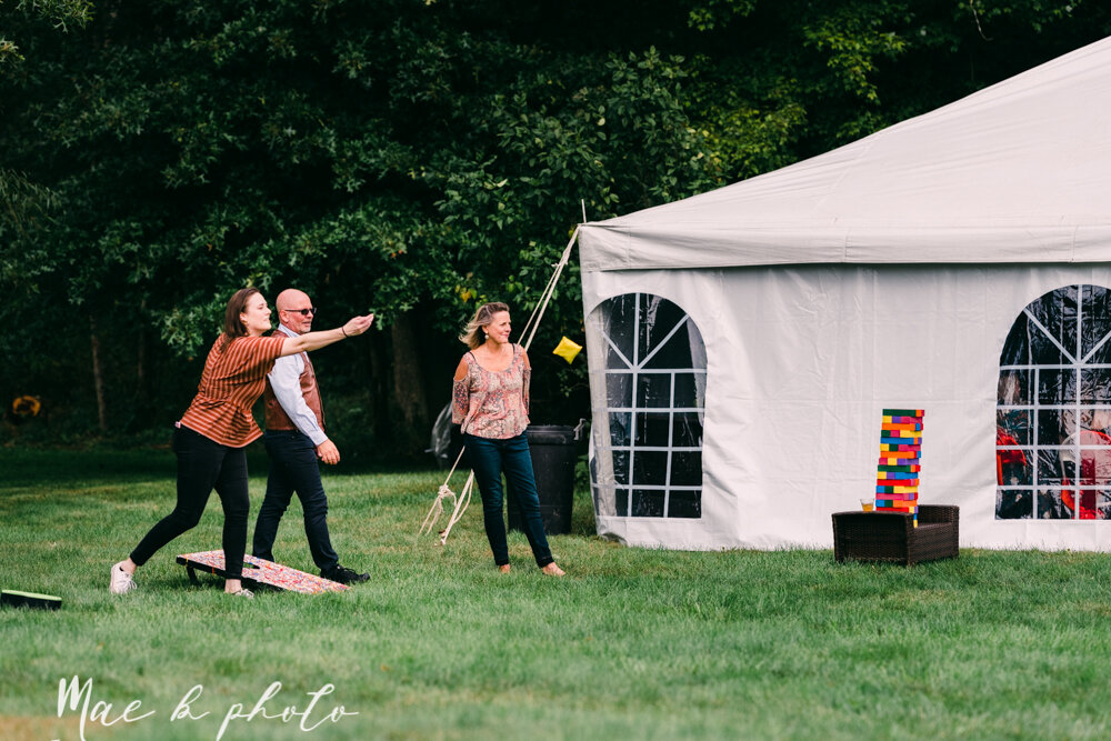 allie and nickie's colorful summer backyard pride wedding in kent ohio photographed by youngstown lgbtq wedding photographer mae b photo-127.jpg