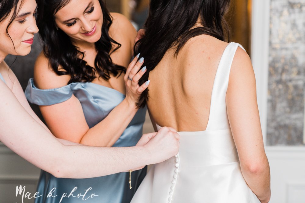 ana and josh's winter personalized wedding at union square tower in downtown warren and the grand pavilion at the grand resort in warren ohio photographed by youngstown wedding photographer mae b photo-17.jpg