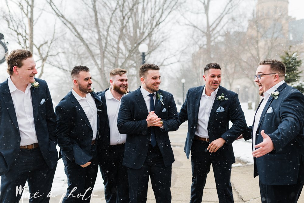 ana and josh's winter personalized wedding at union square tower in downtown warren and the grand pavilion at the grand resort in warren ohio photographed by youngstown wedding photographer mae b photo-58.jpg