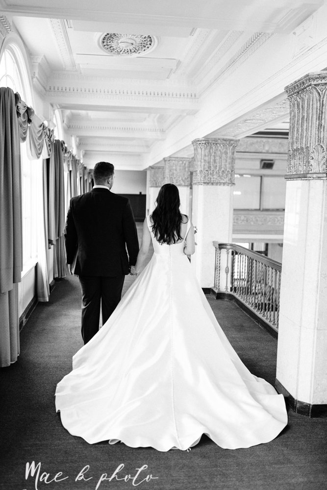 ana and josh's winter personalized wedding at union square tower in downtown warren and the grand pavilion at the grand resort in warren ohio photographed by youngstown wedding photographer mae b photo-71.jpg