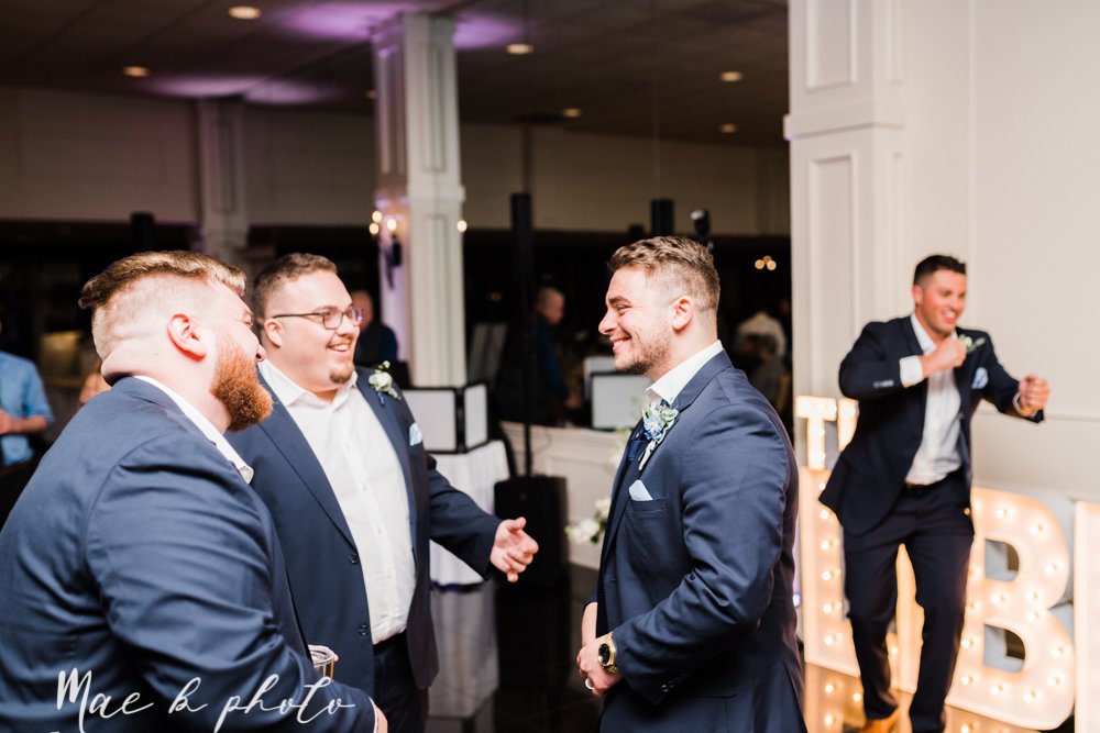 ana and josh's winter personalized wedding at union square tower in downtown warren and the grand pavilion at the grand resort in warren ohio photographed by youngstown wedding photographer mae b photo-97.jpg