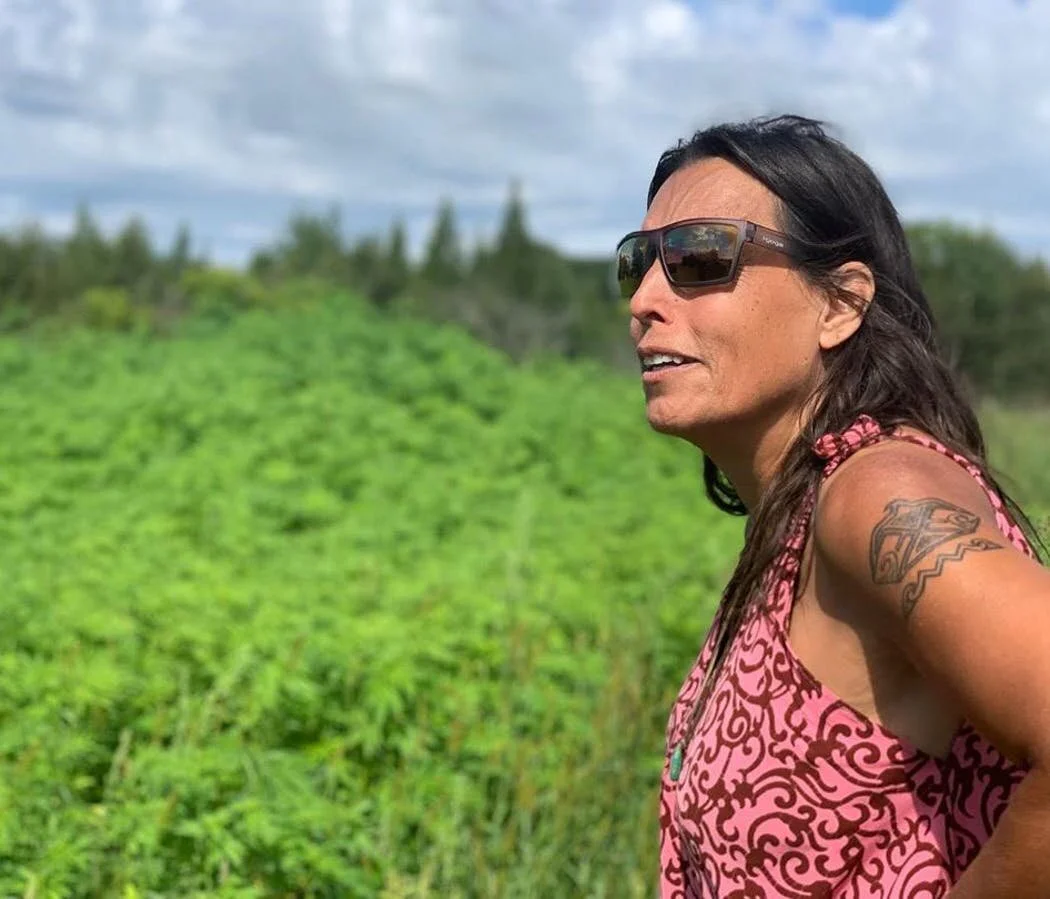 Winona in her Hemp field at Anishinabaa Ag 