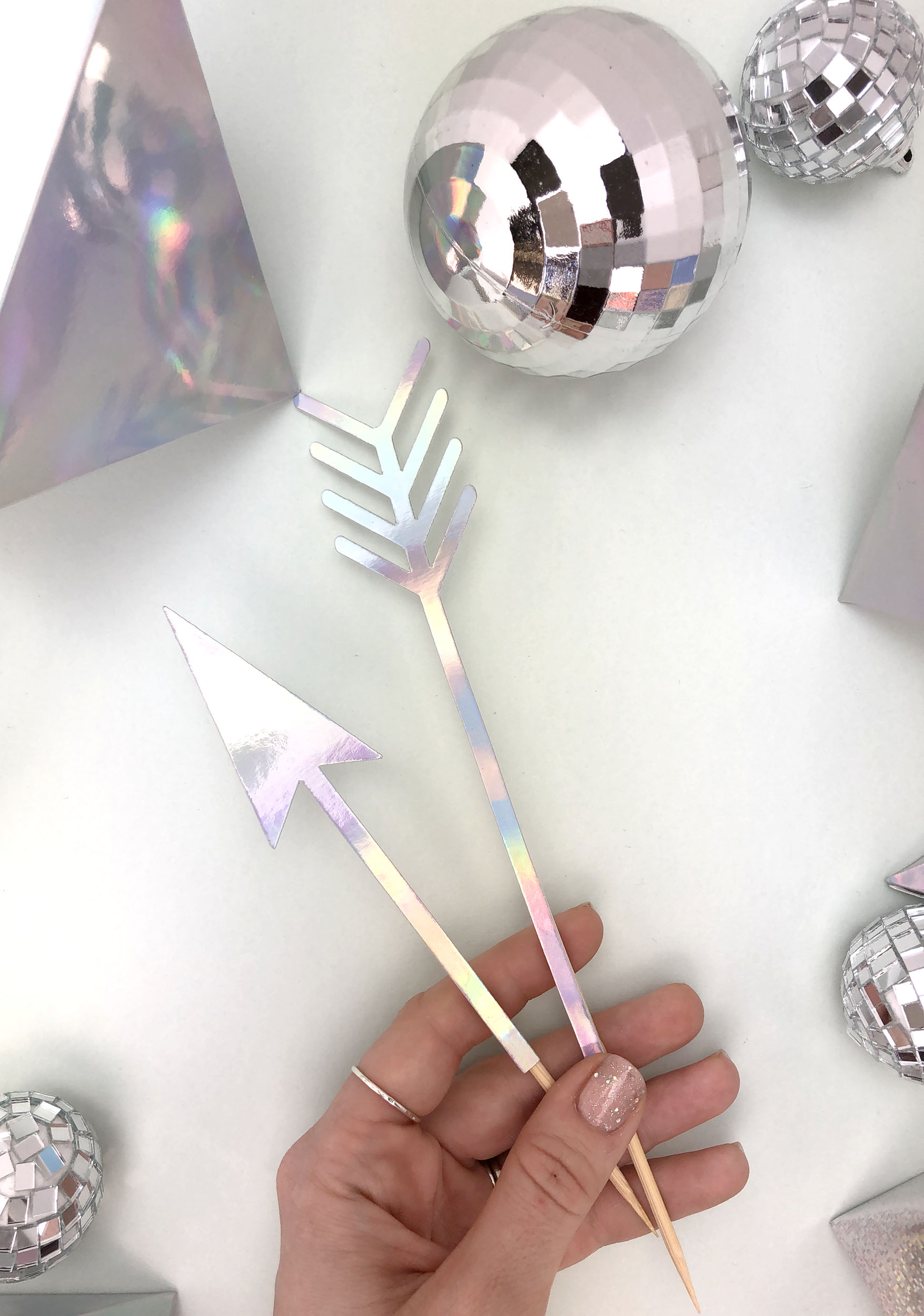 iridescent arrow cake topper