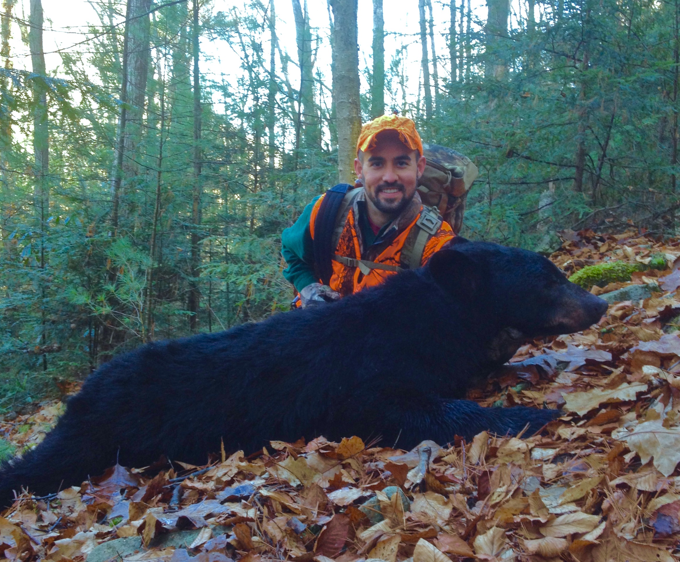 Tyler up in the mountains with the black bear