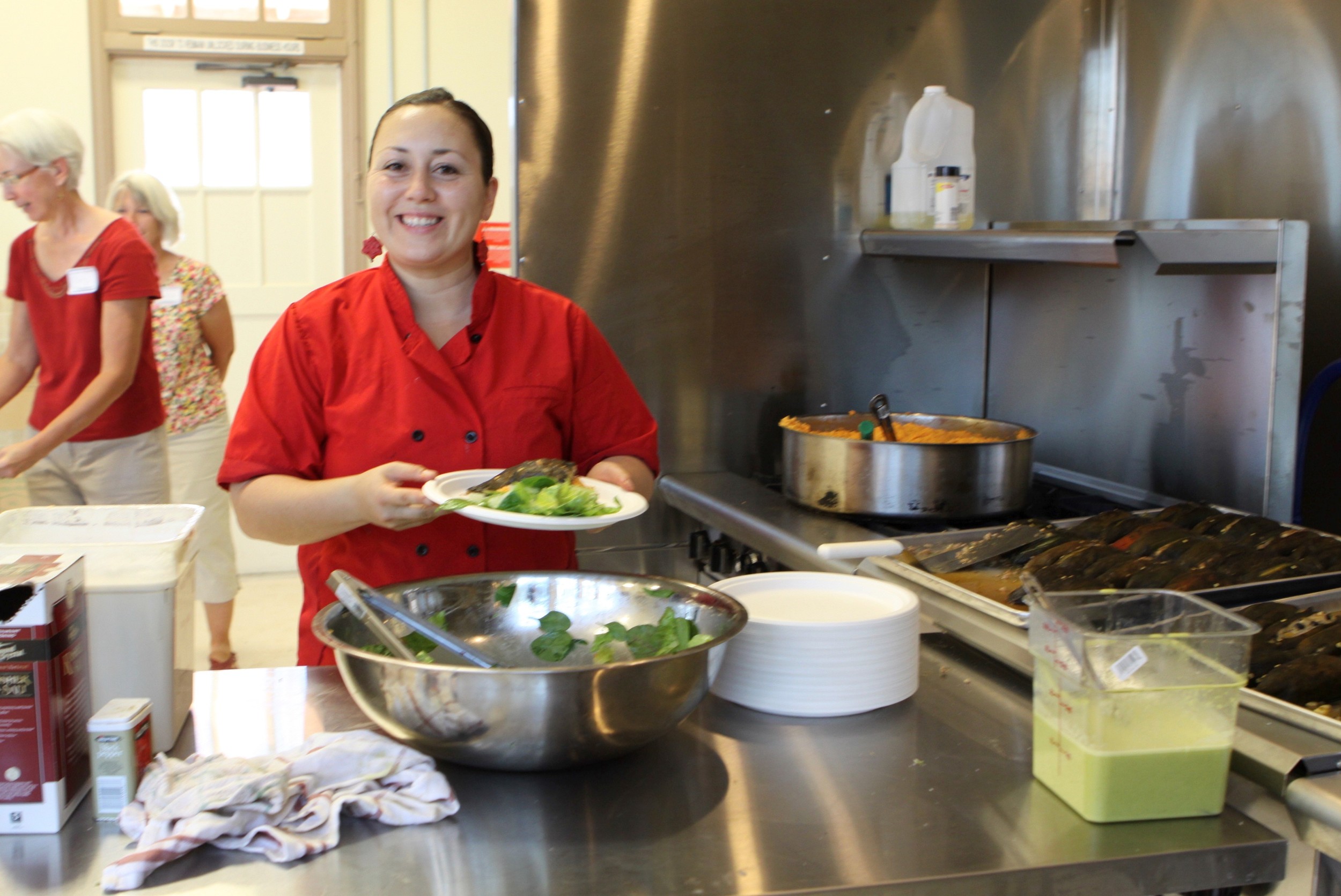 Local chef Christina Vega-Zubiate catering a meal