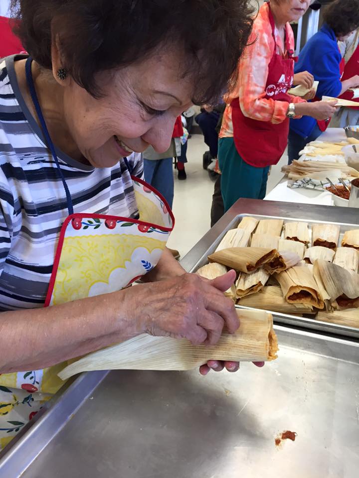 A local resident and home cook demonstrates how to make tamales