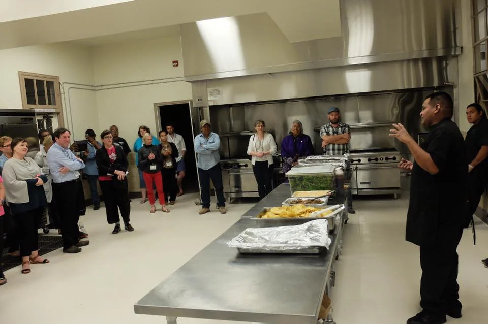 Brian Hendricks from Desert Rain Cafe shares traditional and contemporary Tohono O'odham dishes with a group of guests
