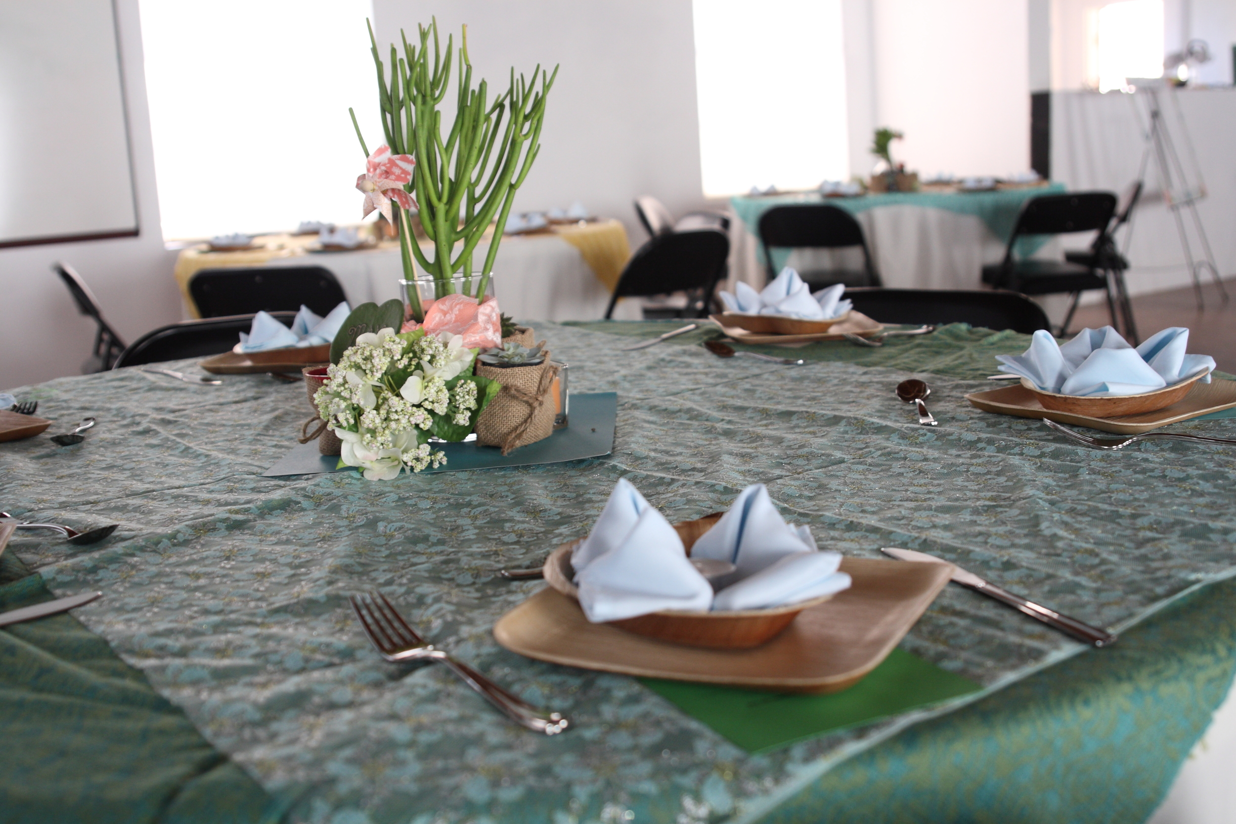 Creative planners and DIY couples will love the blank slate aspect of the Conference Center. Lacey and Matt of Denver, CO and their friends made these wonderful centerpieces.