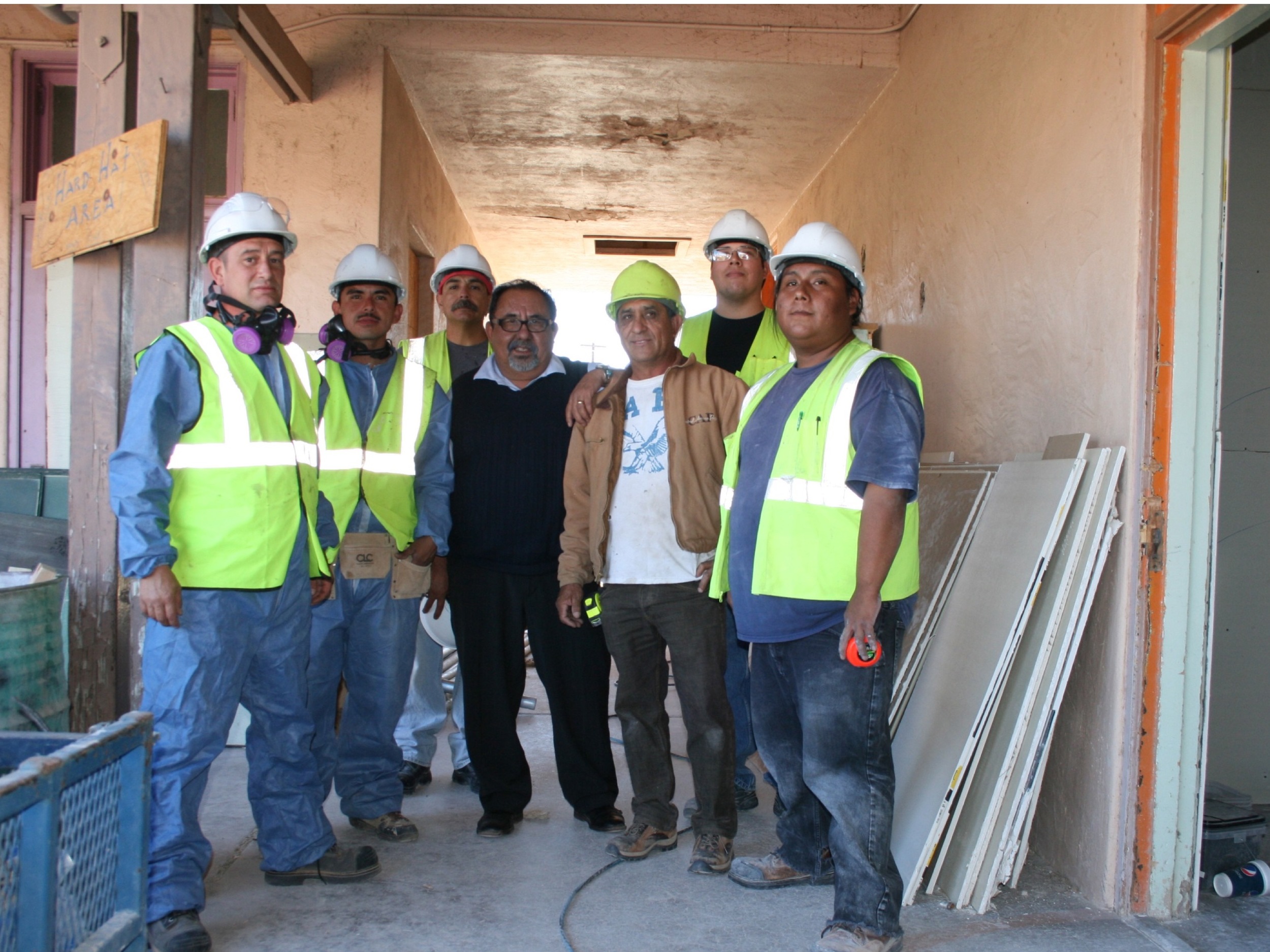 A crew of Journeyman Apprentices with US Representative Raul Grijalva. 