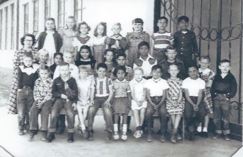 An old class picture taken by the front gate