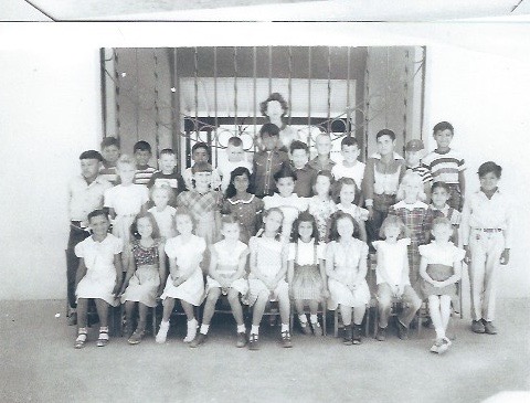 An old class picture taken by the front gate