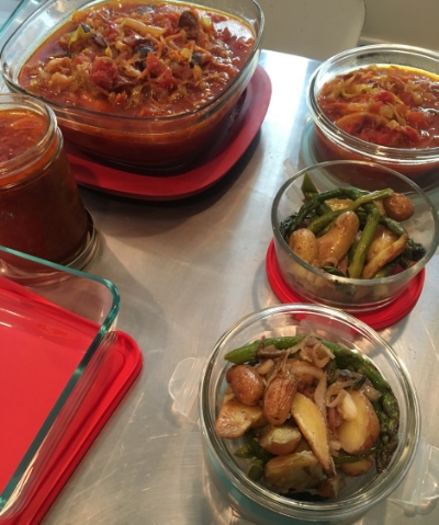 Part of the meal prep process is packing individual and family meals in separate containers. The right side, are items heading for a lunch bag, the left is family dinner at least once this week.