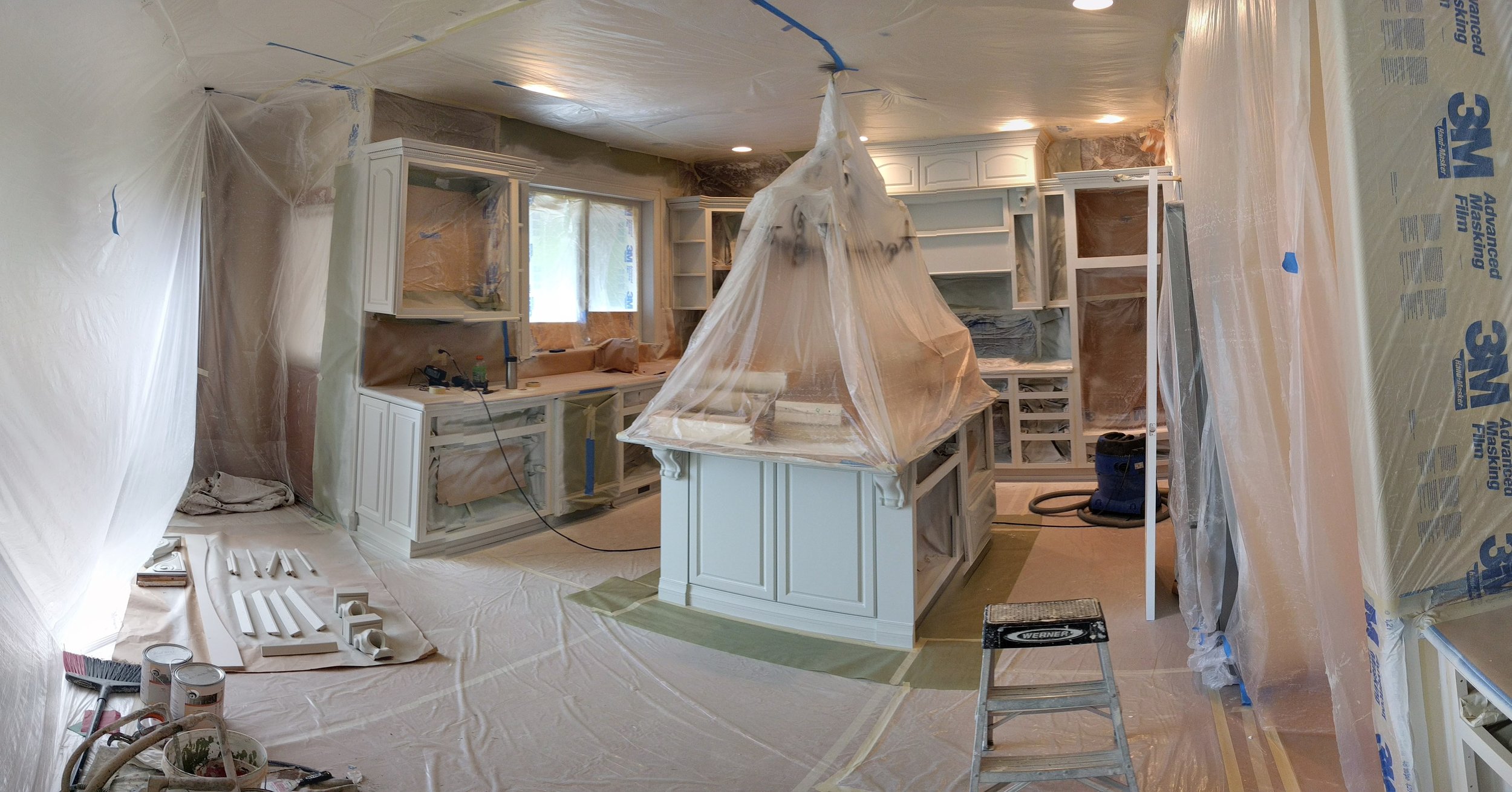  Cabinet painting requires a lot of masking and protecting of the home. 
