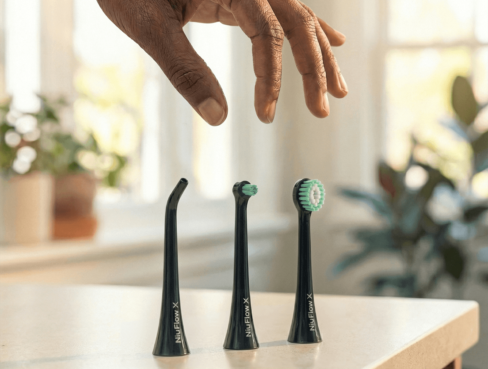 Hand Picking Up Brush Heads (2) (2).png