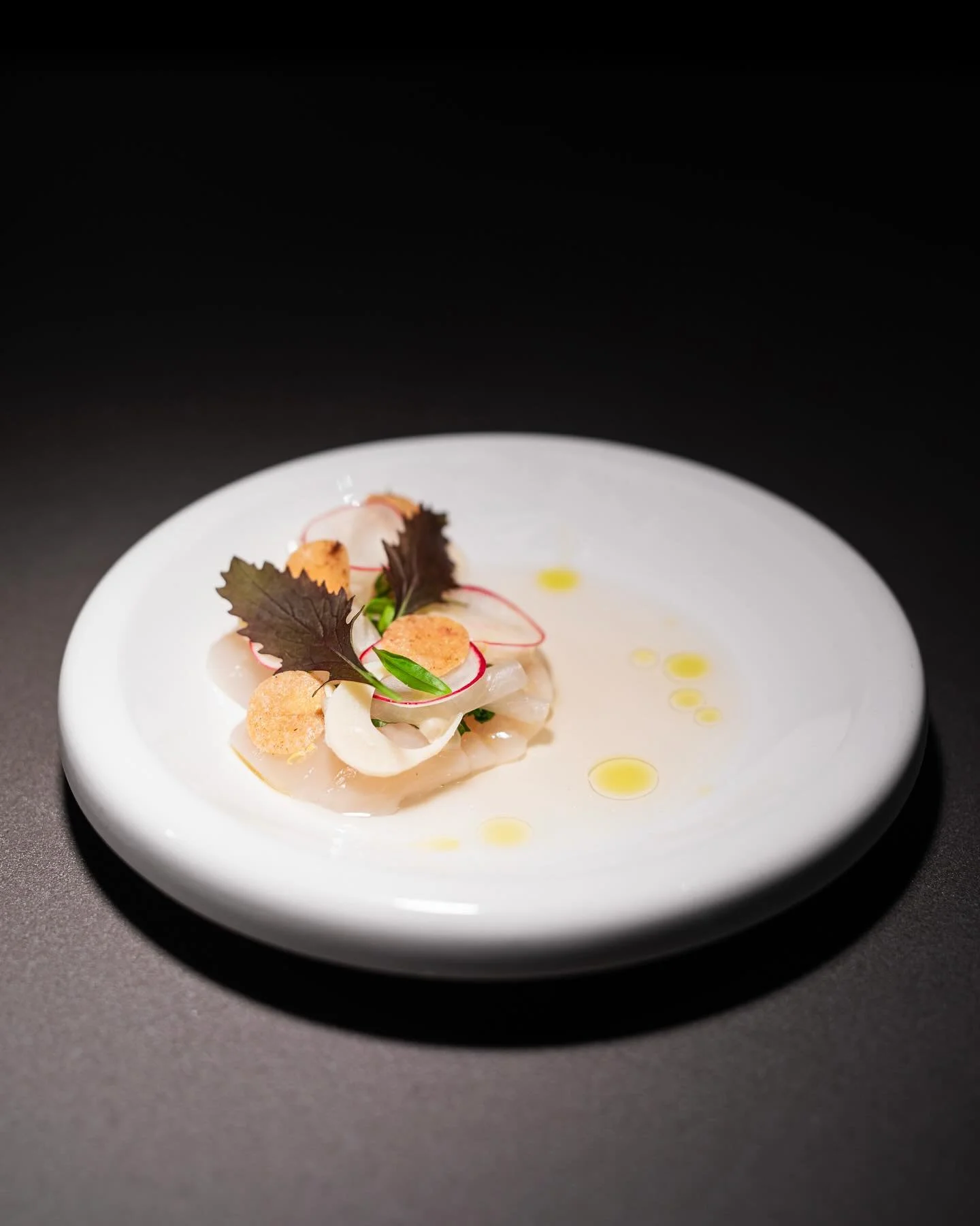 Hokkaido scallop crudo
Pickled daikon, shiso, yuzu vinaigrette

📷: @jcmadenphotography 
.
.
.
.
.
.
.
#labattoirvan #alacarte #labattoirchefsmenu #yvrchefs #ourgastown