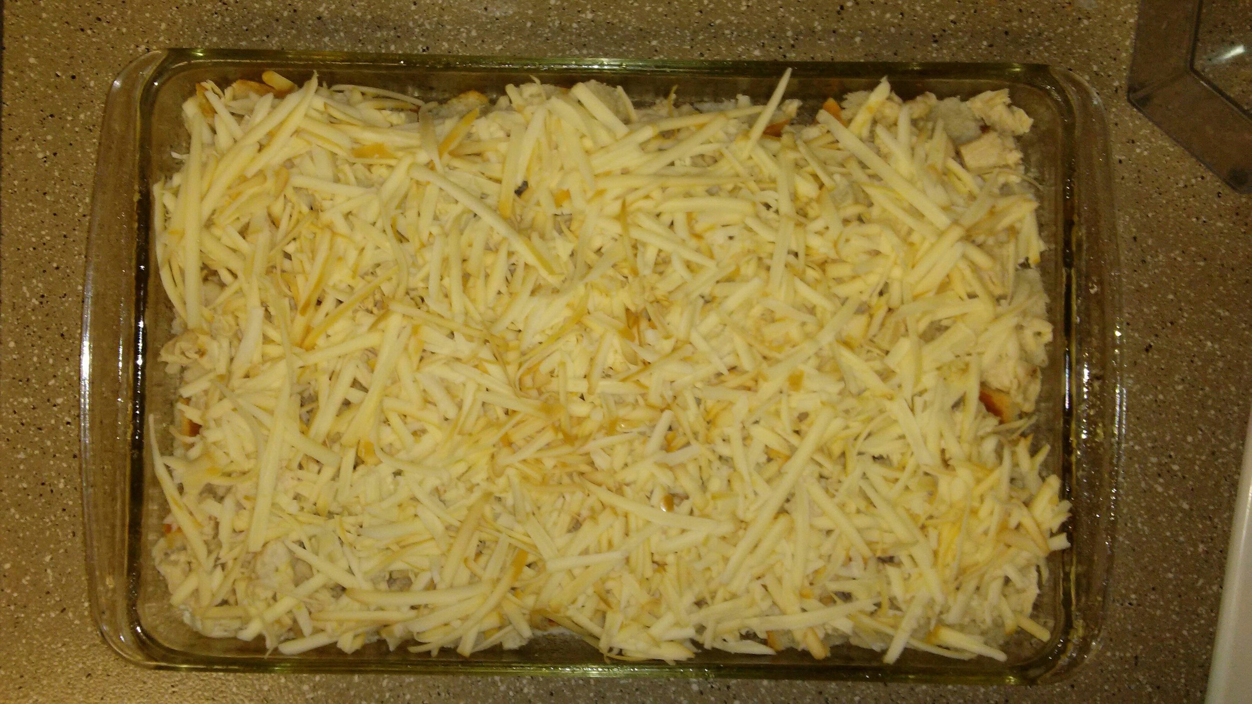 Add the freshly shredded cheese