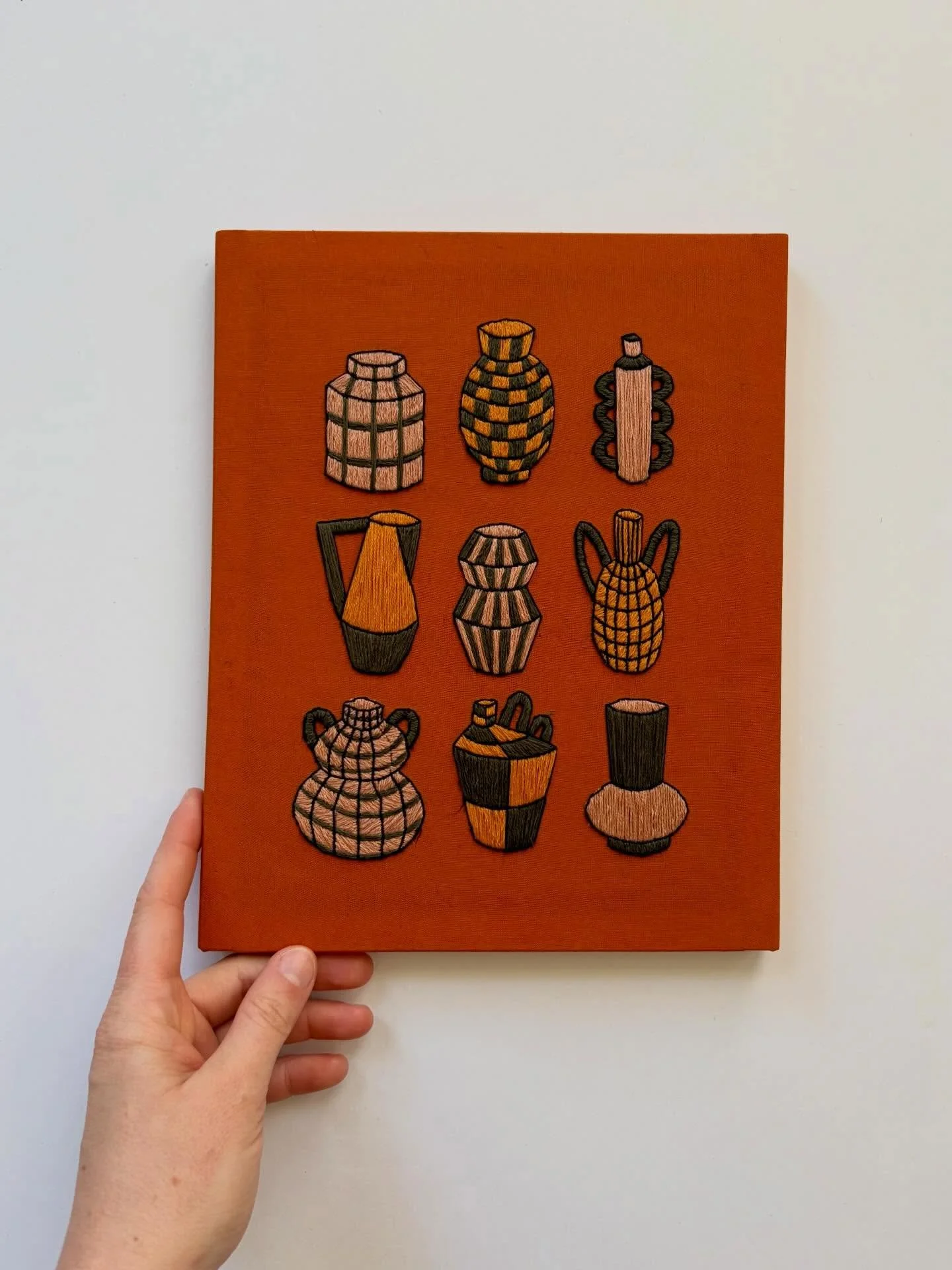 Into it.

PEEL. STICK. STITCH. these pottery pieces onto whatever you like!