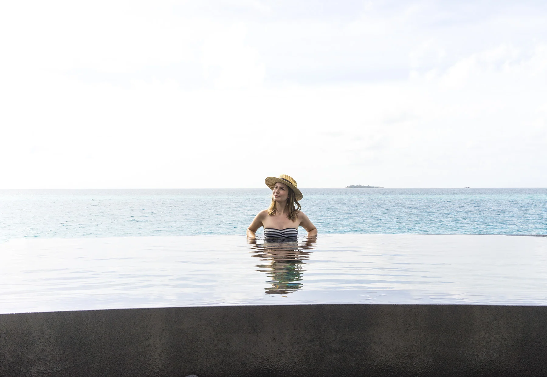 Bathing in one of the water villa's private infinity pool 