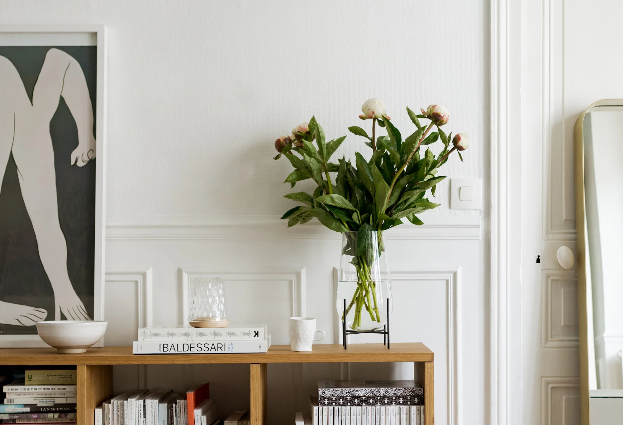 glass vase with peonies